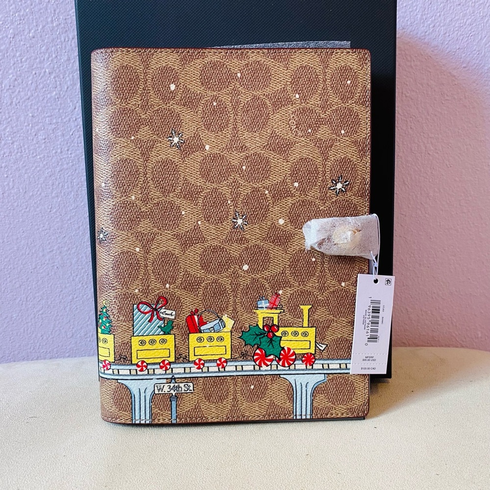 Coach Notebook in Signature Canvas with Holiday Train Brass/Tan Caramel Multi